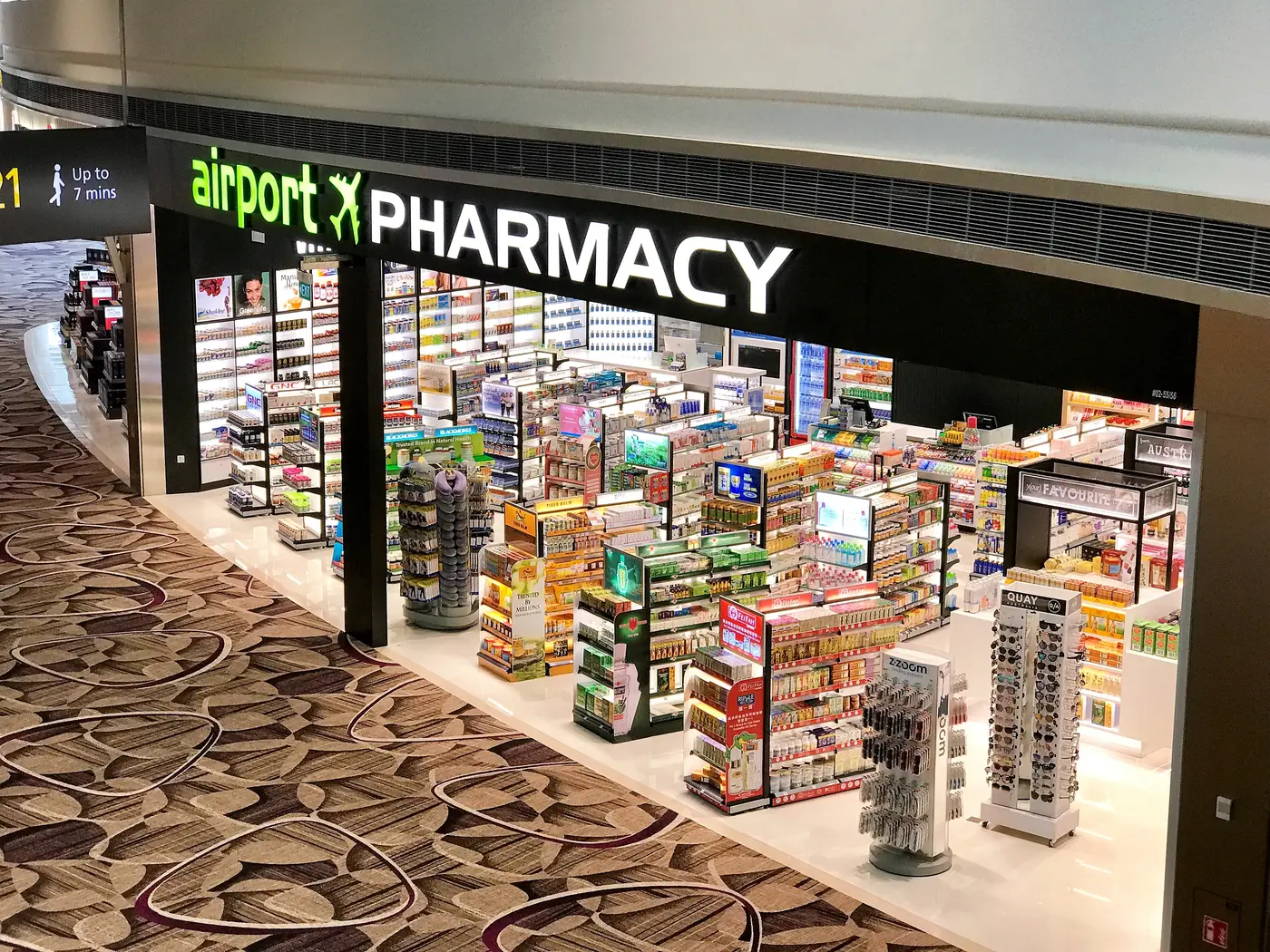 Airport Pharmacy shopfront in the departure transit at Changi Airport Terminal 4